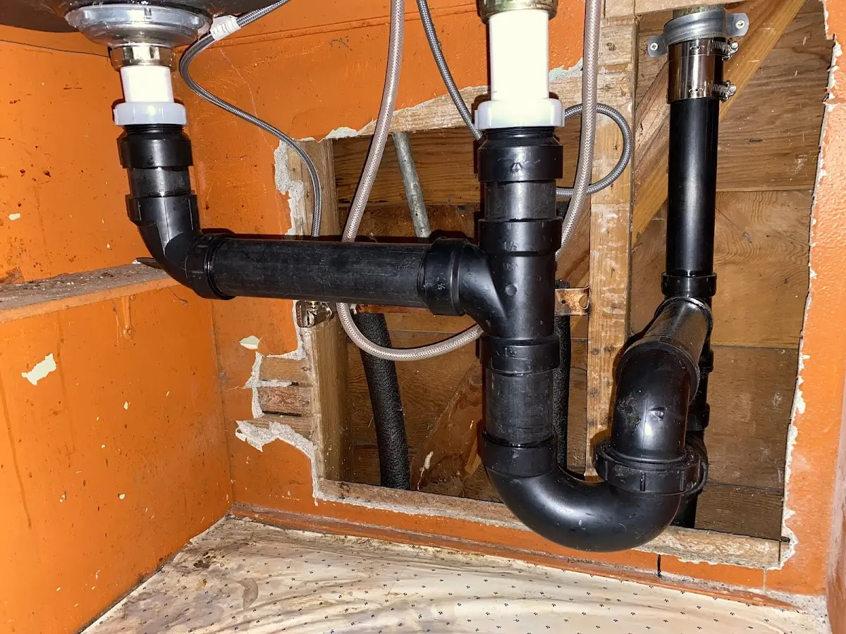 Professional Garbage Disposal Repair equipment and tools on the job in Bath
